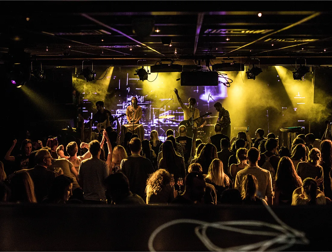 Band performing on stage in front of an audience during SoAlive Music Festival in Sofia
